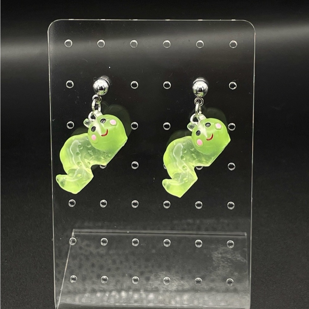 Glow in the dark caterpillar stud earrings